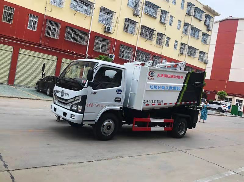 國六東風多利卡7方自裝卸式垃圾車參數圖片介紹